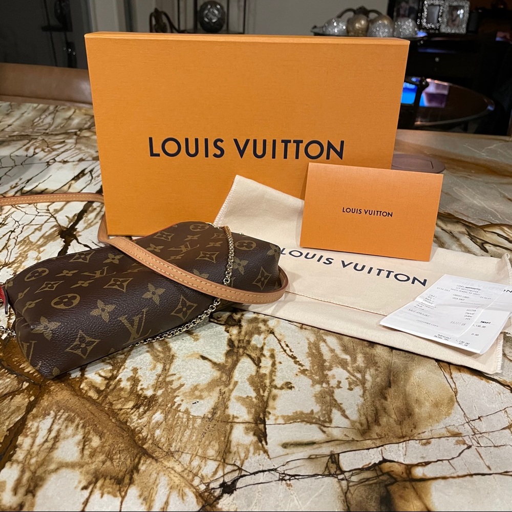 Louis Vuitton Palles Clutch